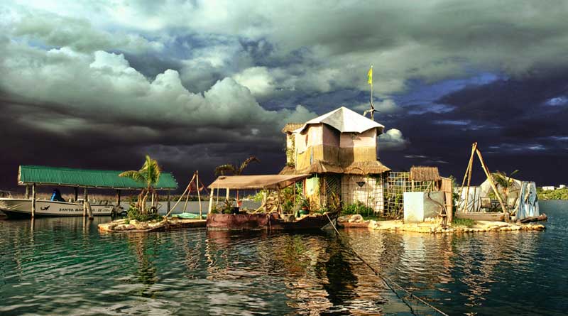 Meet the man who lives on a floating island made of plastic bottles