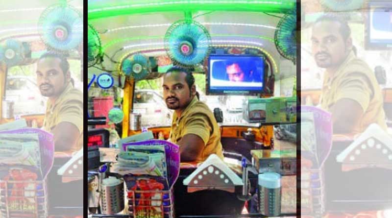 Here's why passengers stop to take selfies with him and his three-wheeler