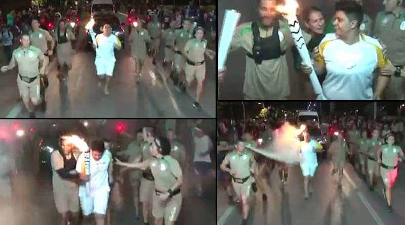 Protester attempts to put out Olympic flame 