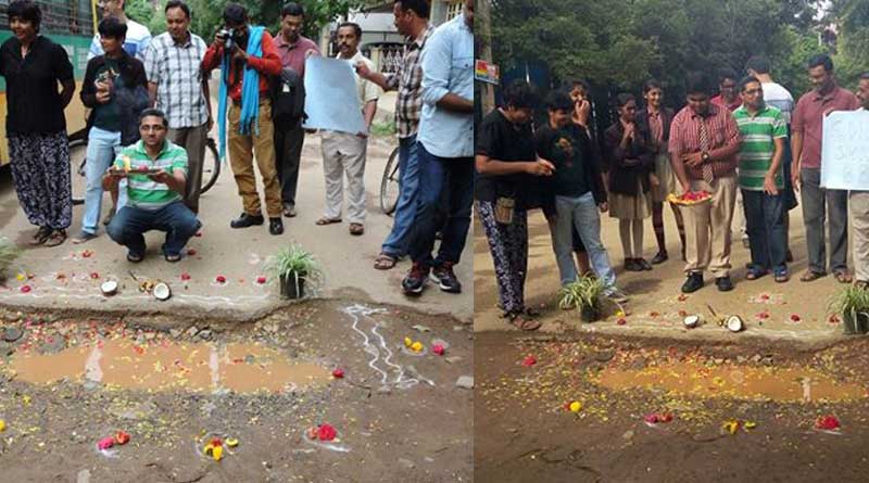 residents-of-bengaluru-did-pothole-pooje-to-get-authorities-to-fix-their-roads