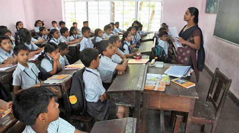 Private tutor protesting in Balurghat