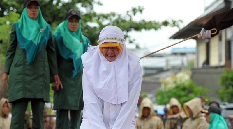 Woman Screams In Pain During Caning In Indonesia