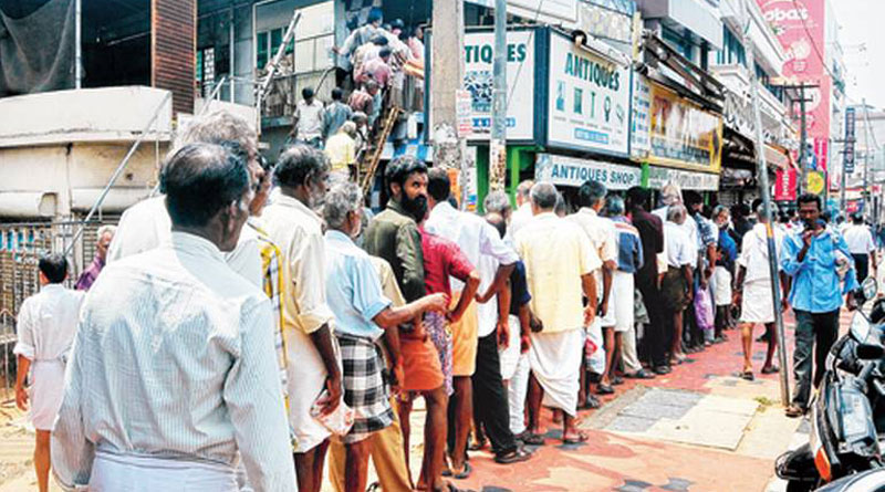 People of TN gathered before liquor shops when Amma suffers in hospital