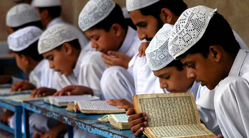 Land sharks attack Madrasa, assault girls in Malda