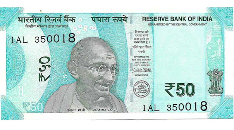 Wet Rs 50 note sheds colour, quality questioned