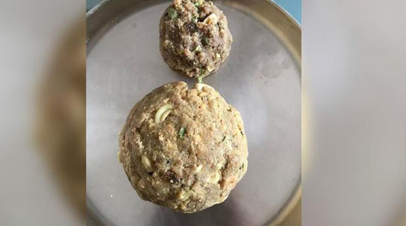 Seeking special status for Andhra Pradesh TDP MPs distribute ladoos in Parliament