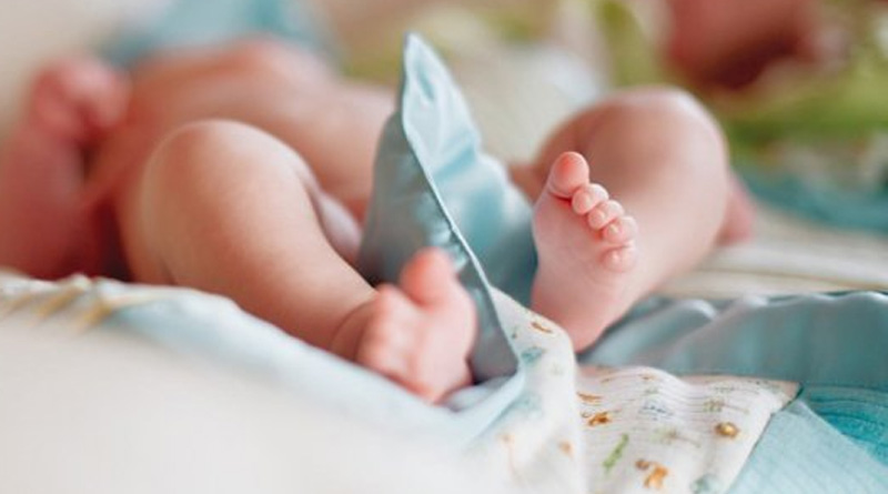 The child was born outside the uterus in the hospital