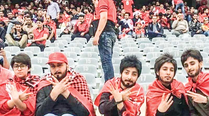 Iranian lady football fan watch match from gallary 