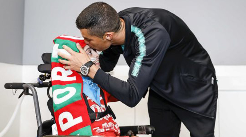 Cristiano Ronaldo meets physically challenged children during football WC practice match