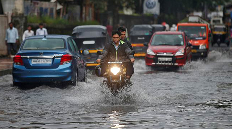 kolkata hit by heavy rain disrupting traffic in busy hours