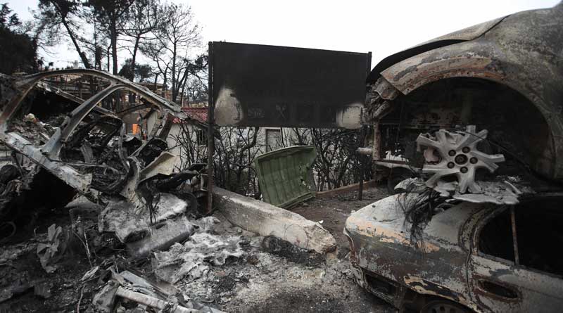 Groom missing as newlyweds caught in Greece wildfire, toll rises