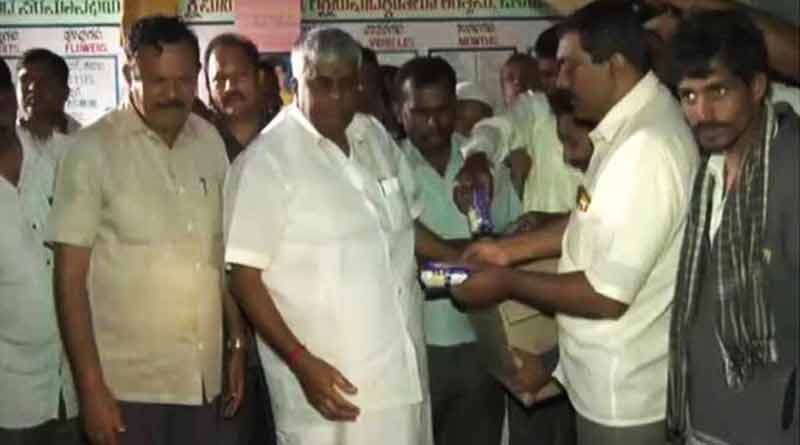 Revanna throwing biscuit packets Kerala Flood Victims, viral video