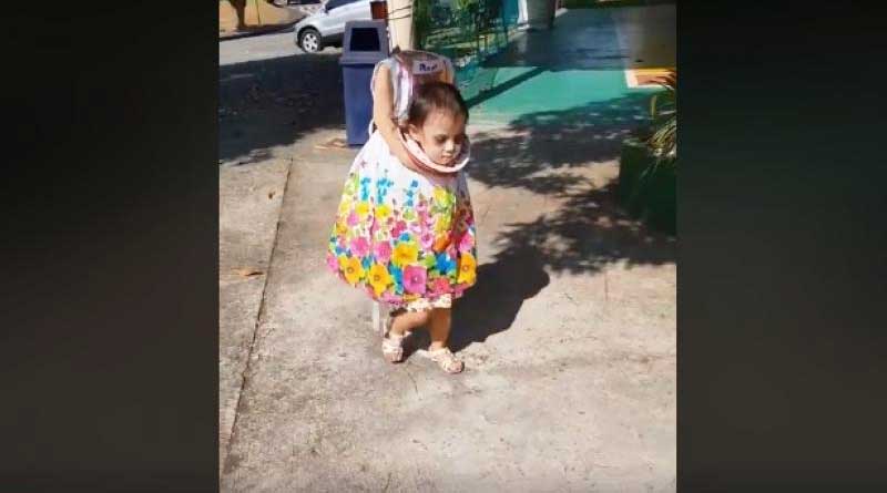 Headless girl goes trick or treat on Halloween