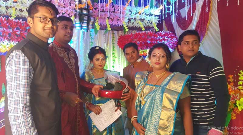 Helmet gifted to invitees in Bardhaman
