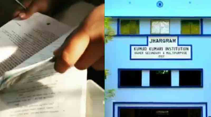 Students capture video in the examination hall 