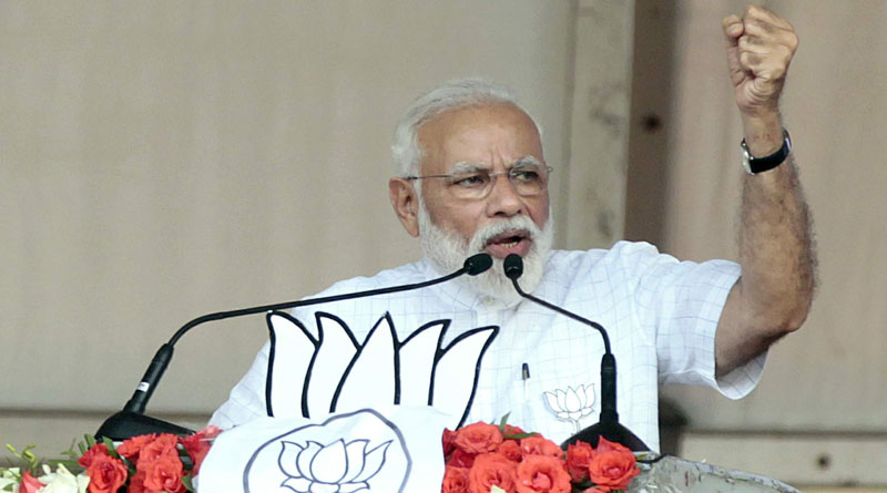 Bengal BJP Leader gifts Narendra Modi Tagore's book