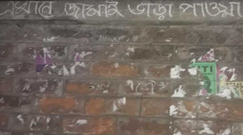 Curiuosity sparks over an advertisement at wall about Jamai Shasthi