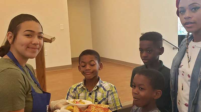 US graduate student celebrates success by feeding pizzas to homeless