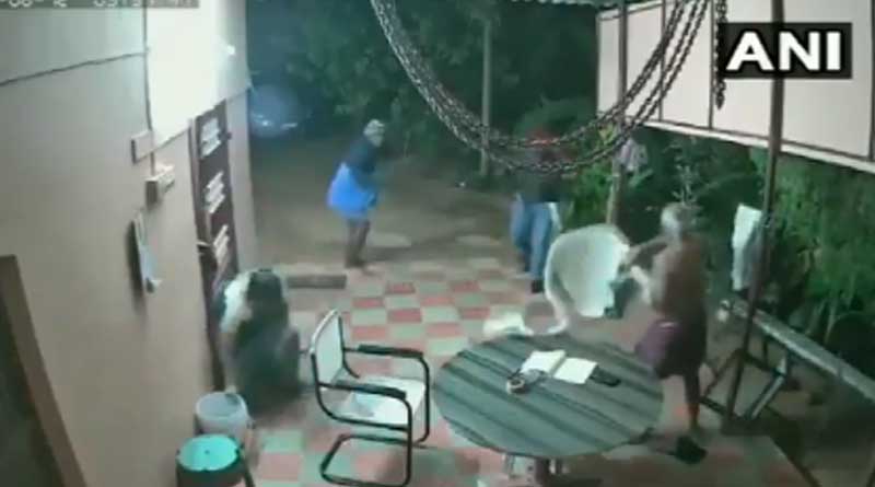 Elderly couple bravely fights against armed robbers with slippers & chair.