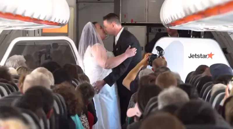 Symbolizing their love for aviation, couple gets married on a plane