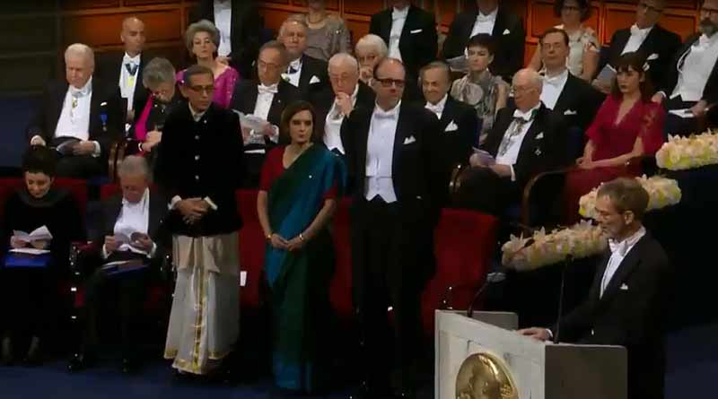 Abhijit Bannerjee,Esther Duflo wear bengali attire while recceiving Nobel Award