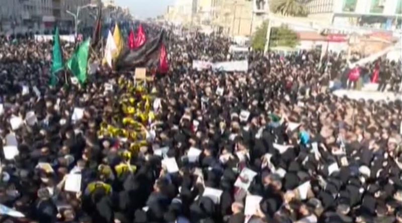 Mourners flood the streets as Qassem Soleimani's body returns to Iran
