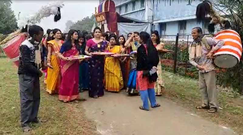 In Saraswati Puja, boys and girls students exchange gifts in Burdwan University