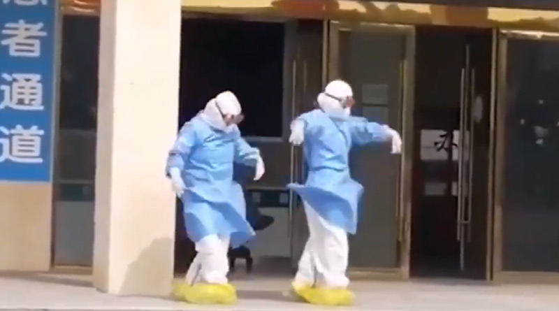 Medical attendants dancing to celebrate recovery of patient's coronavirus