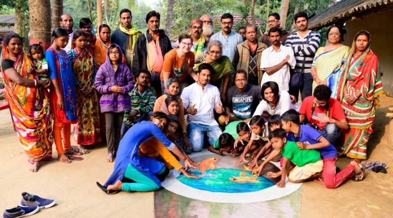 3D painter from US paints a pond with fishes at a Shabar village,Jhargram