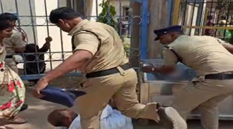 Caught on cam, cop seen kicking man grieving his dead daughter