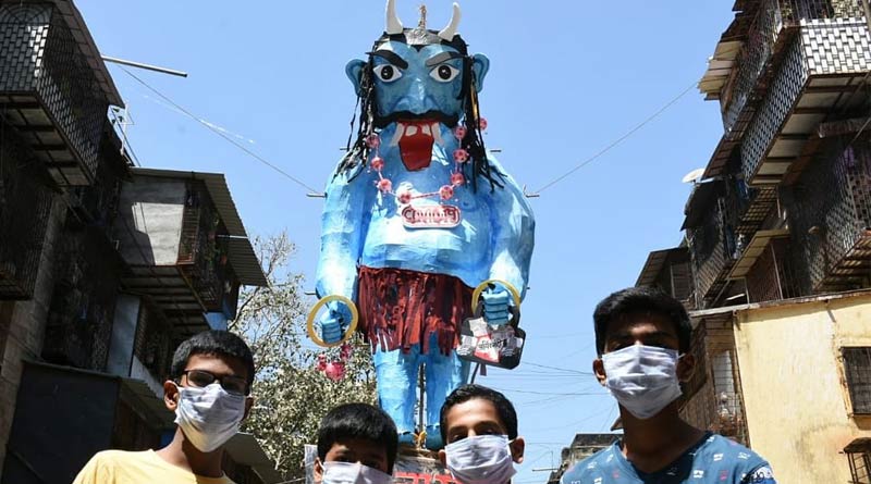 Mumbai's people burn coronasur in Holika dahan, 2020