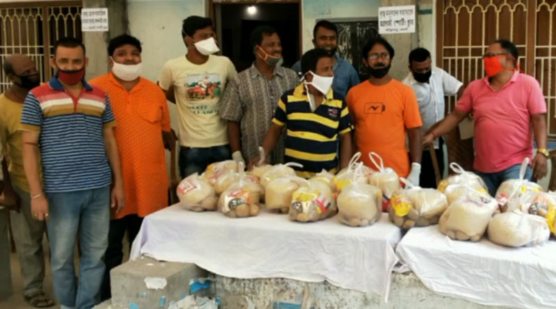 All political parties get together to distribute food to the distressed people in Bongaon