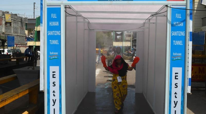 Auto sanitizing tunnel at Jorasanko fruit market to avoid corona infection