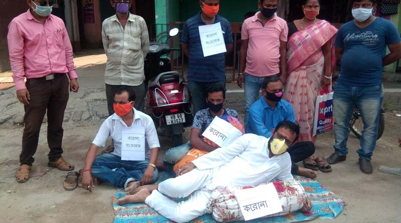 BJP Leader on road to protest with 'Corona Cushion'