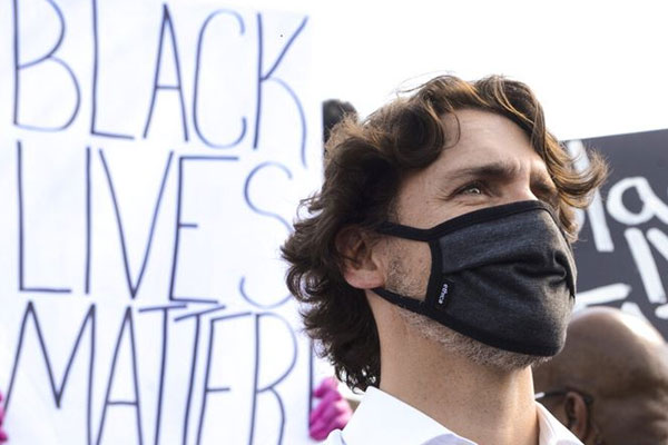 Trudeu-in-black-protest1