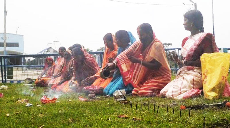 Siliguri and Raigunj women worships Corona as goddess