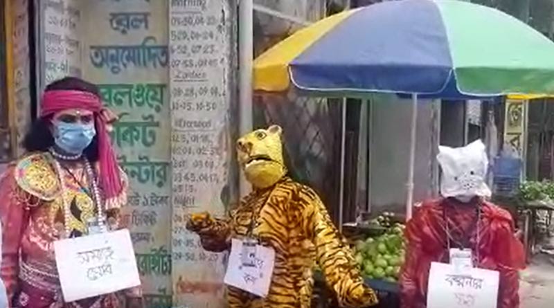 Men in disguise of Tiger and Deer campaign for Corona awarness at Canning