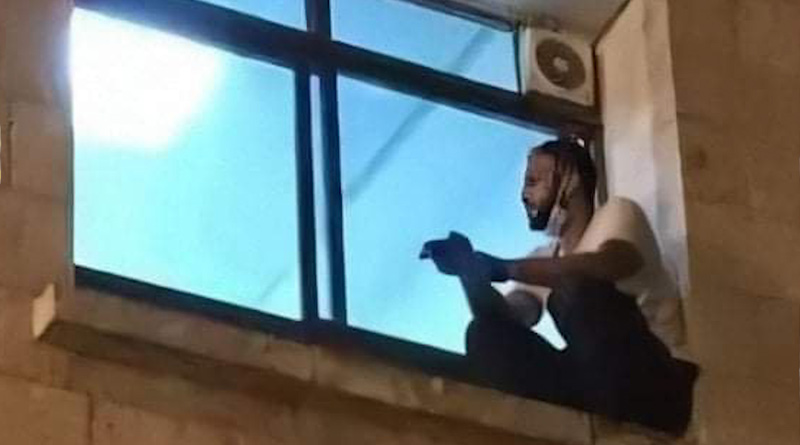 Man scales hospital wall to see his covid-19 positive mother