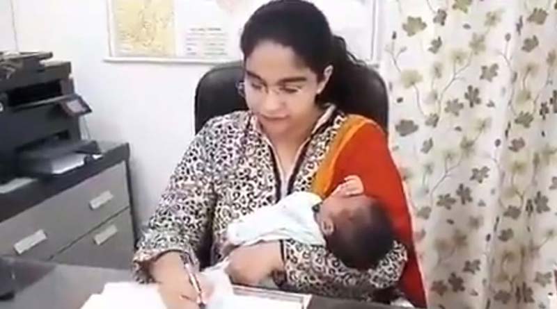 Video of UP SDM working with 3-week-old Baby in Arms goes viral | Sangbad Pratidin