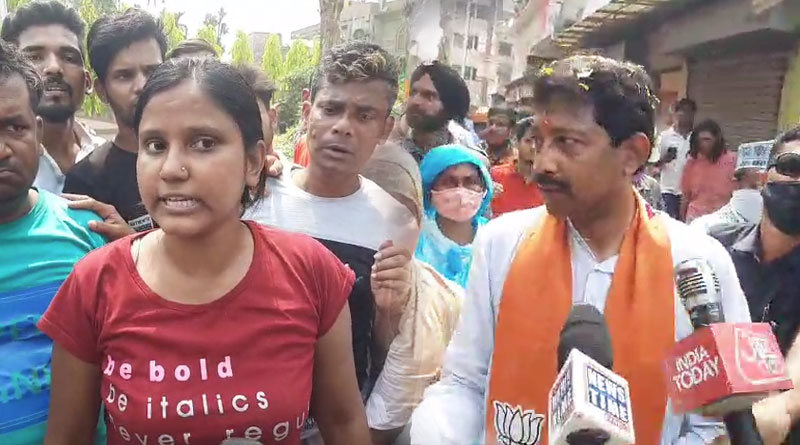 WB assembly Election 2021: TMC workers show Black flag to BJP candidate Rajib Banerjee | Sangbad Pratidin