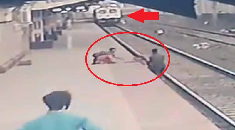 Viral video: A railway man from a station of Mumbai risked his life and saved a child's life । Sangbad Pratidin