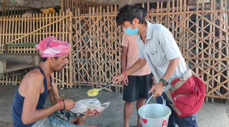 Migrant labourer served street dogs' food at Japlaiguri, controversy arises | Sangbad Pratidin