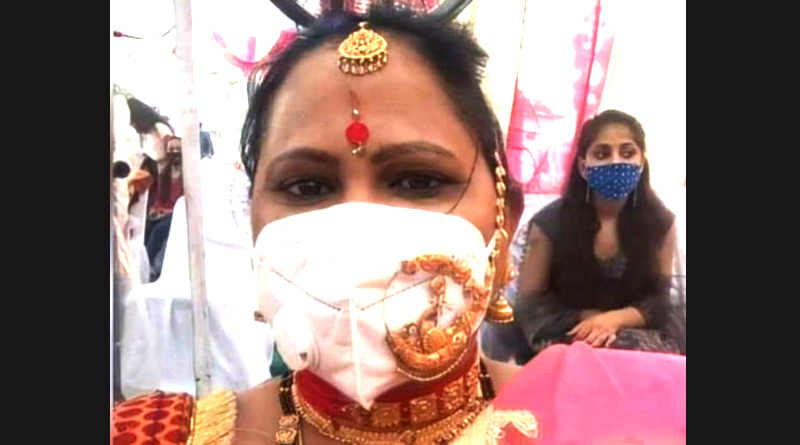 Jewellery Jugaad: Picture of woman wearing nose ring over face mask at wedding goes viral | Sangbad Pratidin