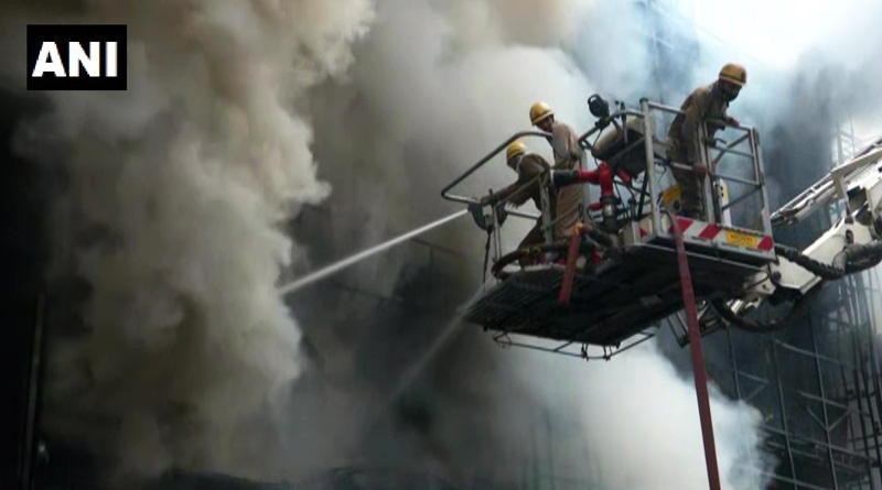Firefighting operation underway at a clothing showroom in Lajpat Nagar, Delhi | Sangbad Pratidin