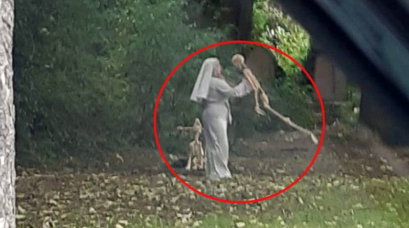 Nun dances with skeleton in Hull general cemetery, footage viral in social media । Sangbad Pratidin