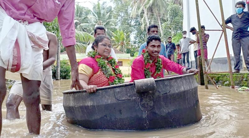 Kerala Couple converted a large aluminum cooking vessel into a boat to reach their wedding venue | Sangbad Pratidin