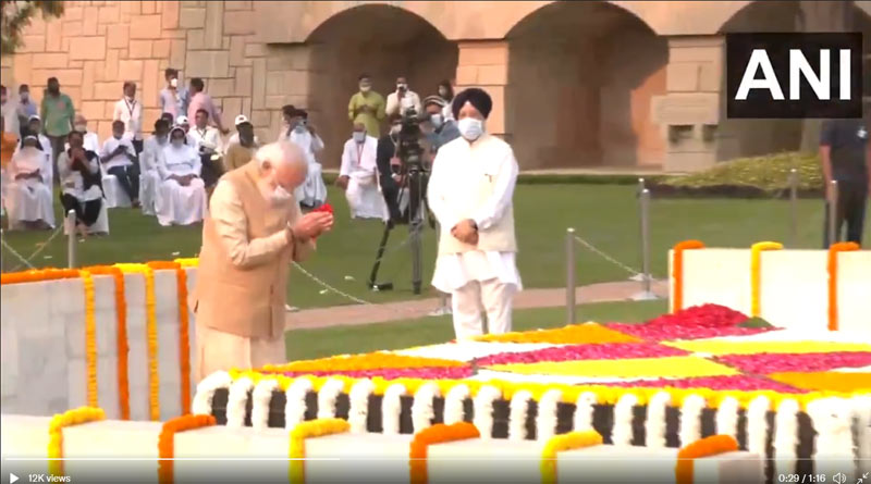 Prime Minister Narendra Modi pays floral tributes to Mahatma Gandhi at Rajghat | Sangbad Pratidin