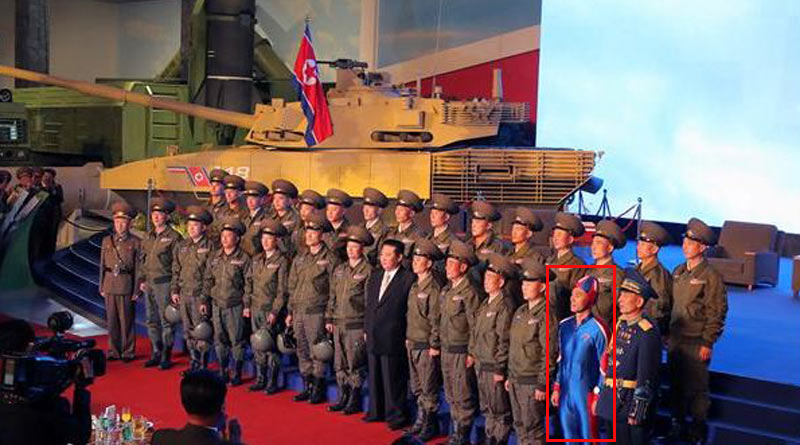Pic of soldier wearing super-tight blue outfit while posing with Kim Jong-un goes viral। Sangbad Pratidin