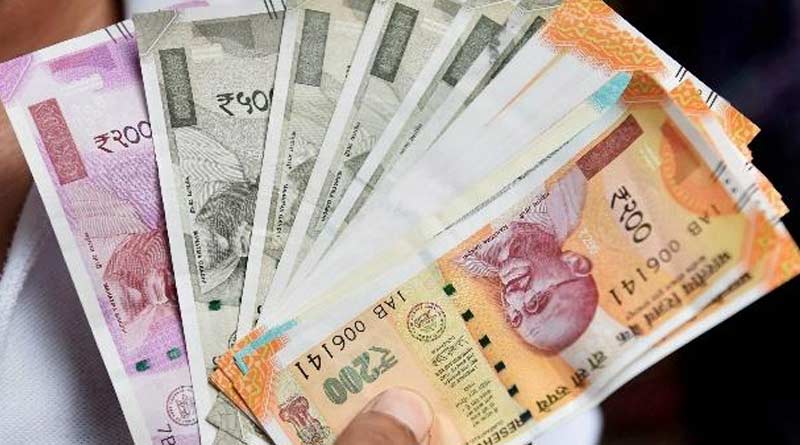 A businessman win 1 crore rupees in lottery | Sangbad Pratidin