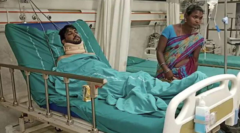A woman unwilling to marry a man allegedly slashed his neck। Sangbad Pratidin